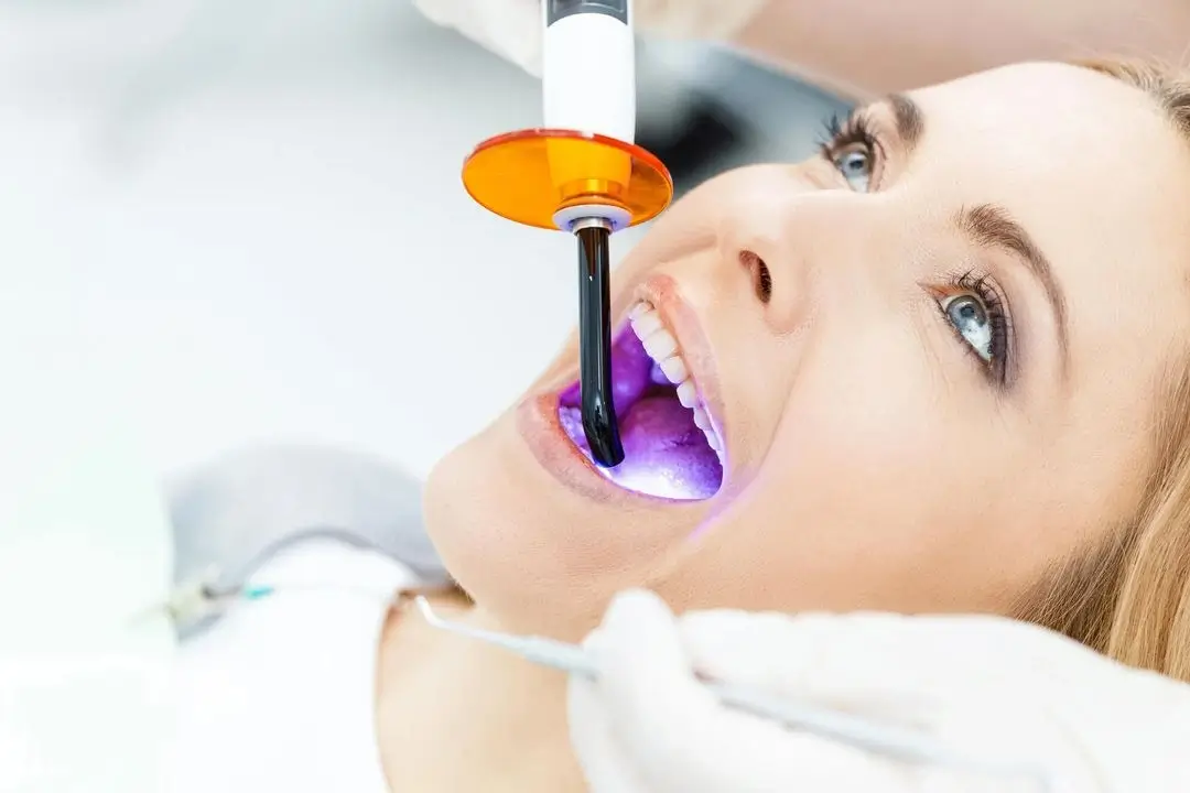 woman getting auburn teeth whitening treatment
