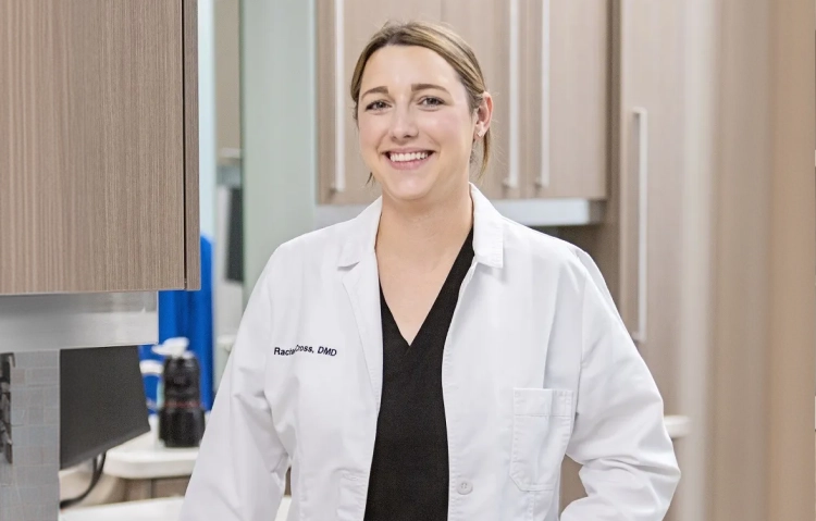 Dr. Rachael Cross, D.M.D., Auburn dentist, standing in a dental treatment room at Thrive Family Dentistry of Auburn